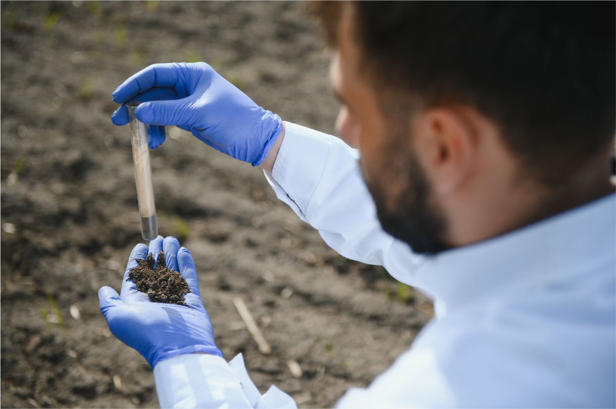 agronomist-studying-samples-of-soil-in-field-2023-12-18-21-41-23-utc 1 (1)